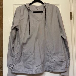 Womens grey v neck scrub jacket with hood. Great condition.